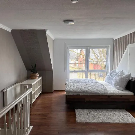Апартаменты Ferienwohnung 1 - 120qm Лоббе